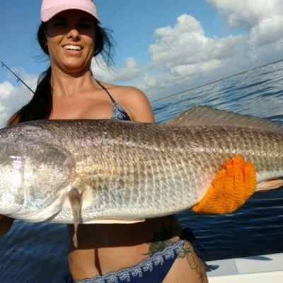 girl with giant redfish